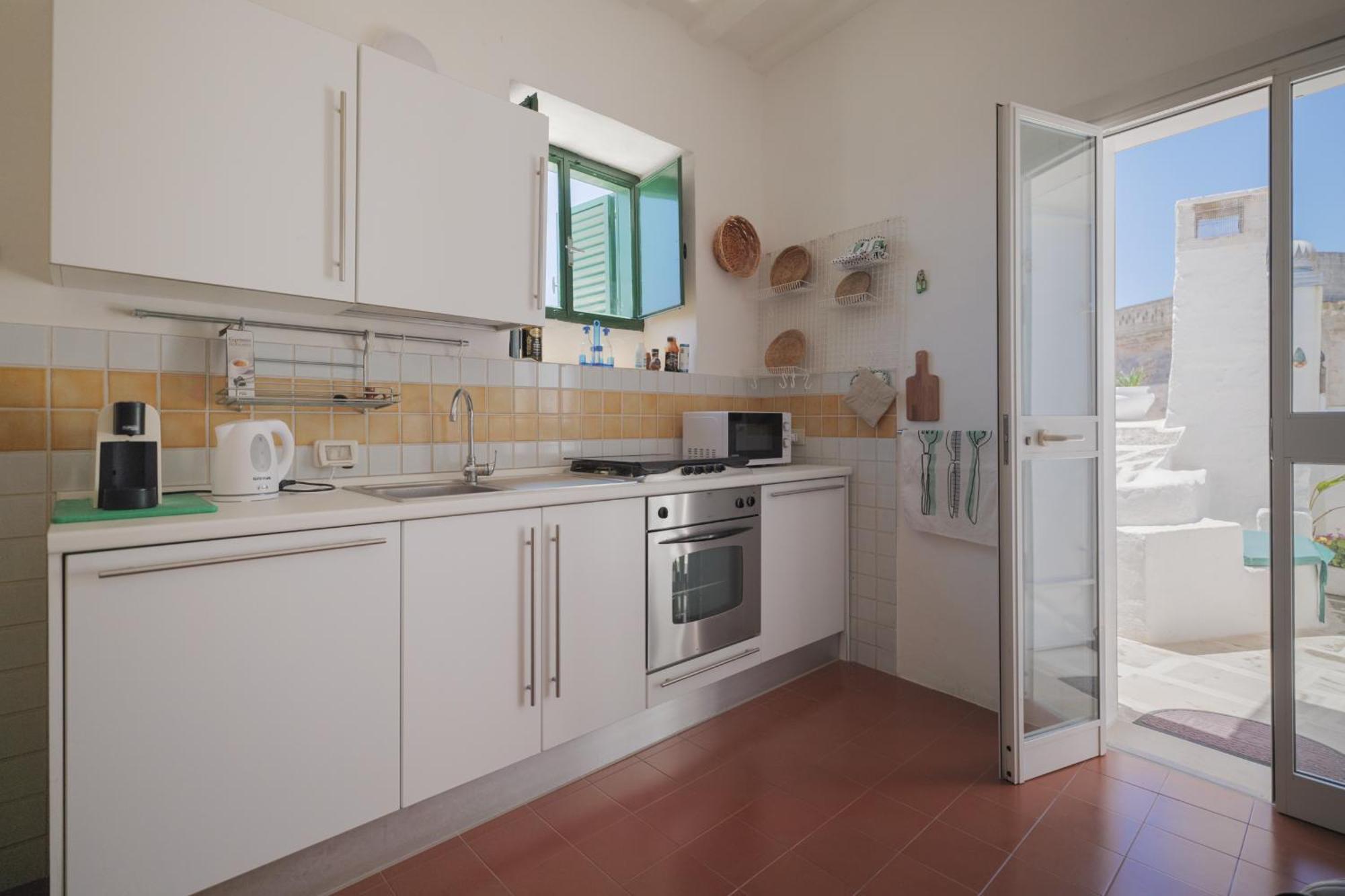 Dimora Lavinia Casa Vacanze Centro Storico オストゥーニ エクステリア 写真